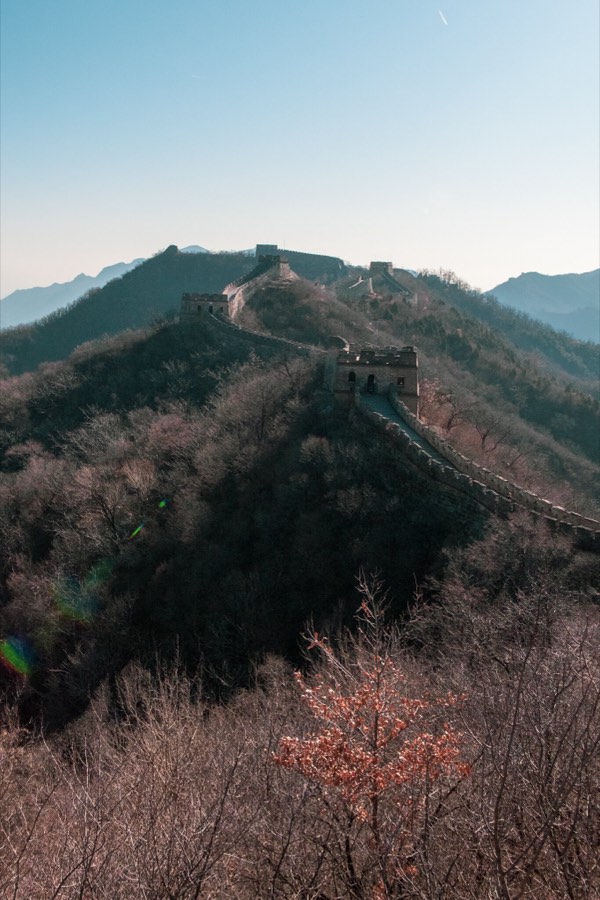 The Great Wall of China running along a bare winter ridge