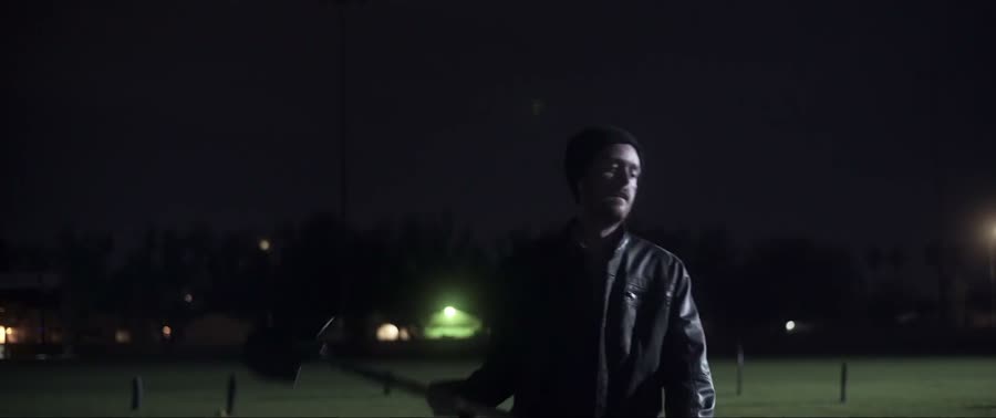 A man alone in a dark field at night with a shovel, from $200,000